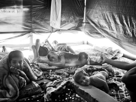Syrian children in a makeshift tent at al-Jarrah in the Beqaa Valley, Lebanon, June 7, 2013 - Moises Saman/Magnum Photos